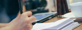 Freelance writers interview people and take notes for their magazine articles and blog posts.