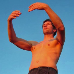 That's me doing standing meditation. I don't usually do it shirtless, but my partner Stephanie and I were at Big Sur at sunset in January, and it was an unusually warm 70 degrees. I'm facing the setting sun.
