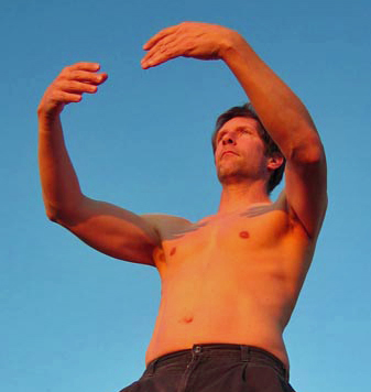 That's me doing standing meditation. I don't usually do it shirtless, but my partner Stephanie and I were at Big Sur at sunset in January, and it was an unusually warm 70 degrees. I'm facing the setting sun.