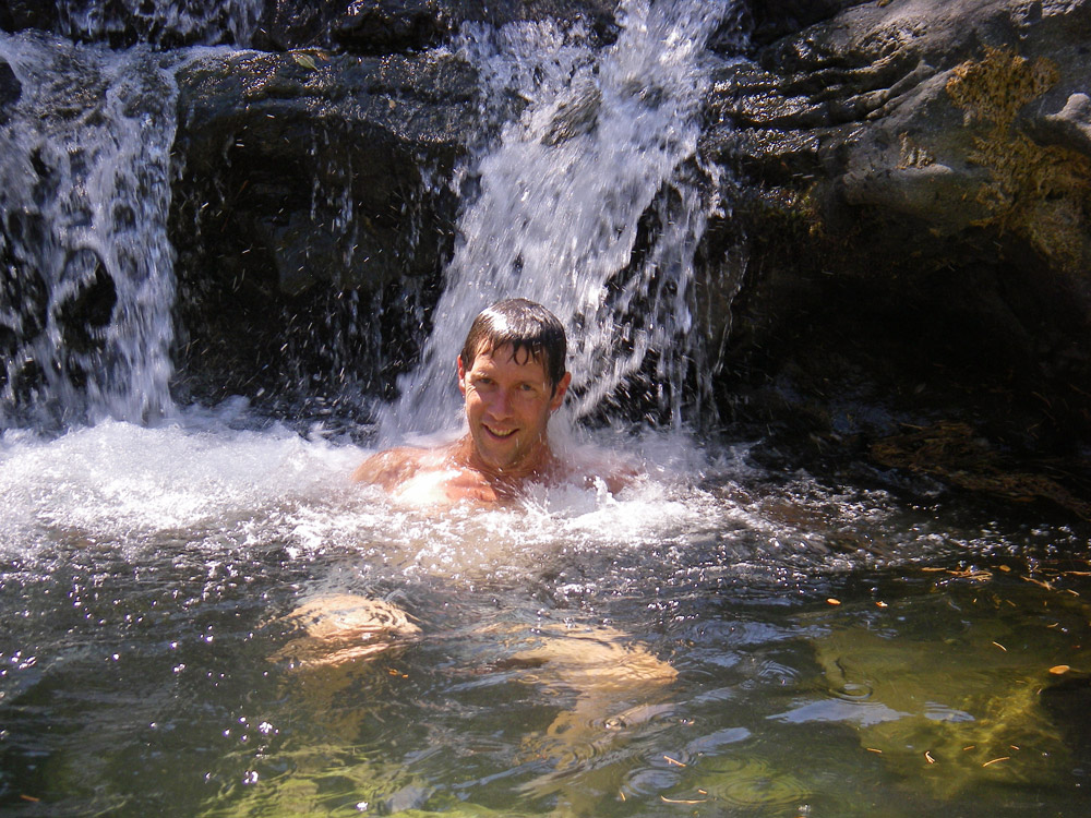 Freelance writer and hiking guidebook author John Soares relaxing in Mears Creek, near the Upper Sacramento River.