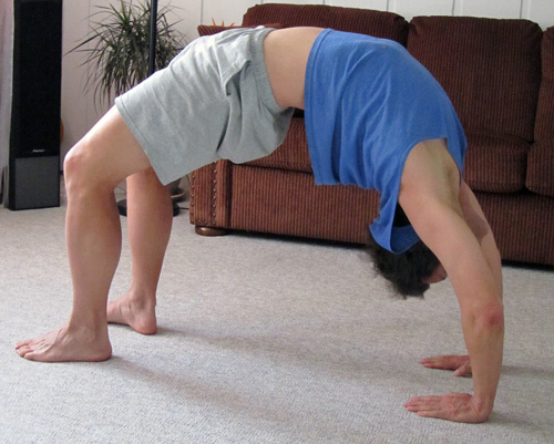 Freelance writer John Soares does his daily yoga back-bend: the wheel pose, chakrasana.